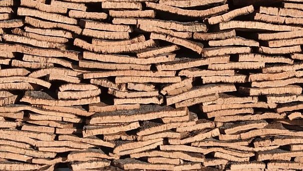 Stacks of harvested cork bark planks